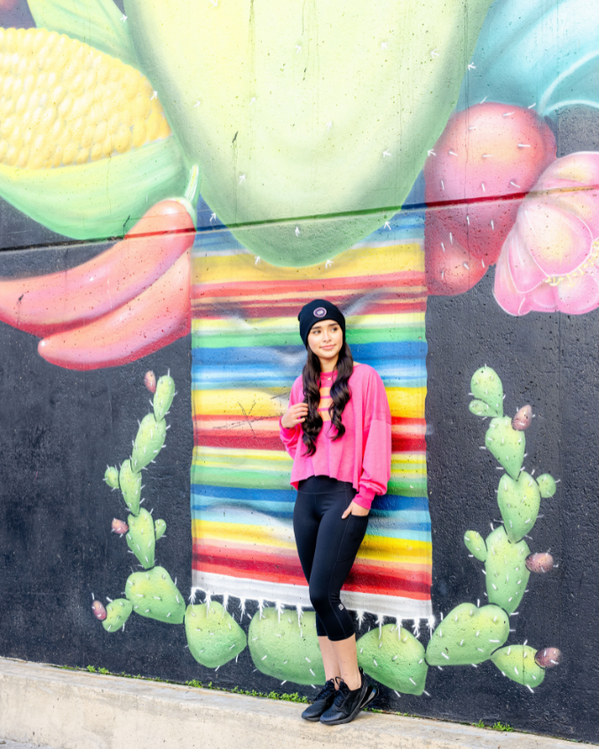 Nikki ā Hot Pink Open Back Long Sleeve with Peach Accents šš